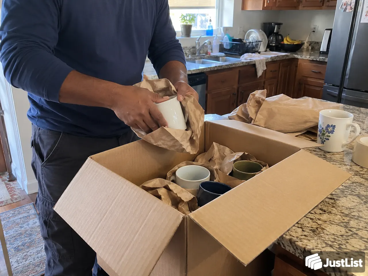 Boxes packed by room, not by panic · Detroit Metro